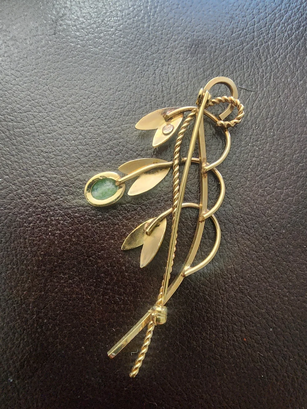 Gold-Tone Floral Brooch with Green Stone Accent